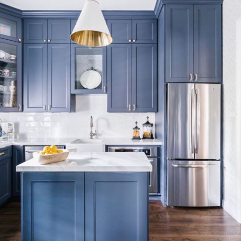 Trends are moving towards adding grays and blues to off white colored cabinets! What do you think!?