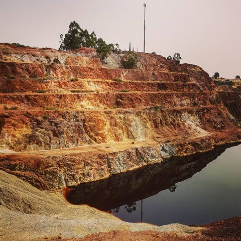 Nature never fails to leave me in awe. This is within an abandoned mining area. This was once a mining pit, now filled with water. The pool of water is blood red due to the iron and acidic build up over the years. #SaoDomingos #Portugal_Lovers #Alentejo 
___________________________________________________
#NatureLovers #Nature_Good #Nature_Photo #Mining #AbandonedPlaces #Abandoned_World #AbandonedWorld #Abandoned #NaturePhotography #Nature_Seek #Natures #GirlsWhoWander #TravelTheWorld #TravelNow #ExploreDeeper #TravelDeeper #OffTheBeatenPath #Acid #TravelMore #TravelLove #Wandering #WanderLust #NeverStopExploring #GetOutStayOut #TheWanderingTourist #TheGreatOutdoors #NatureAtItsBest