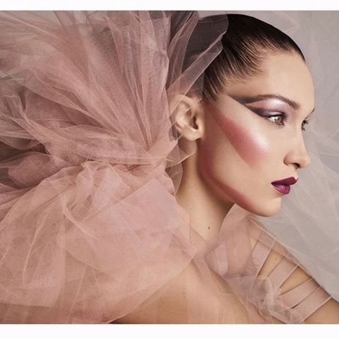 @bellahadid for @voguejapan , shot by @luigiandiango . #hair by @luigimurenu , #makeup by #peterphilips @diormakeup . #styling @paulcavaco @anna_dello_russo , @bitton . #tulle #pink #eighties #beauty