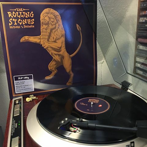 The Rolling Stones „Bridges to Bremen“, released in 2019. I just couldn’t believe it when this album was announced: The Stones’ 1998 concert in Bremen gets an official release! I was born near Bremen, lived in the city for five years, still live nearby and hope to move there sometime in the future. I had seen the Stones a couple of times before this concert, and it was a time when I said I wouldn’t go to any concert with ticket prices over 100 DM (1998 was four years prior to the introduction of the Euro). So ridiculously funny compared to prices I was willing to pay in the future! 😂 Anyway, a friend and I decided to enjoy the concert sitting on the dyke right beside the Weserstadion (my favourite football club’s - Werder Bremen - stadium). We heard every single note when the Stones opened their set with “Satisfaction”. I just returned to our ‘special seats’ when we noticed that a gate had been opened and lots of people rushing in there. The ticket sales had been poor and because the concert was broadcasted on TV they let the fans in for free to get the arena filled. And we managed to get inside too! We only missed one song and half of “Let’s Spend The Night Together”. So this album is a great (and totally unexpected) souvenir from that night. The setlist was quite cool. Yes, the usual suspects but also rarely performed tracks like “Memory Hotel”, a really good cover of Dylan’s “Like a Rolling Stone” and a couple of tracks from the “Bridges to Babylon” album. 〰 🎼🎸🎤🎶🎹 #vinyl #vinylgram #vinylcollection #vinylgen_feature #vinyligclub #vinylrecords #instavinyl #vinyloftheday #vinylcommunity #vinylcollectionpost #vinyladdict #vinyllovers #33rpm #nowplaying #nowspinning #record #recordcollector #recordplayer #recordcollection #goodmusic #therollingstones #rollingstones #bremen