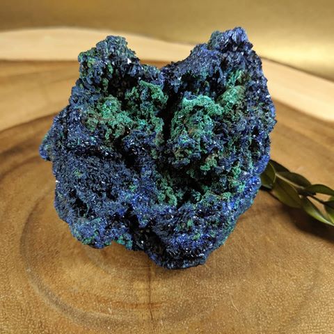 Sparkling azurite-malachite blend! It carries the properties of each stone then a few additional ones when they are used together!! Azurite is a stone of insight and intuition.  It helps clear the mind and open up for Divine, truthful, objective decision making and is helpful with any physical issues with the head.
Malachite is a stone of transformation encouraging one to harness their personal power and to take action in making healthy changes in their lives. It is known to be a strong physical pain reliever. 
Together they increase psychic abilities and help draw out both emotional and physical trauma from the body.
Rough azurite malachite about 3x2.5" $28
DM for availability