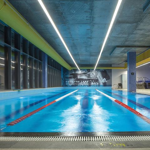 PROJECT SPOTLIGHT | The @goldsgymjordan in Amman is currently the largest operating Gold’s Gym location in the world. The 14,000 sqm flagship gym offers a wide range of facilities, including four swimming pools and studios such as mind/body, cycling and GGX. It also boasts indoor and outdoor gyms, three floors of dedicated ladies training zones and a Kid’s Club. 
The innovative and colorful equipment of the gym guarantees a positive member experience. This is also reflected in the lighting design. The pool and the training areas are illuminated in various arrangements (as lines, rectangles or crossed) by luminaires from Lightnet's Matric series as well as Ringo Star luminaires. The lighting concept in the Kid's Club is supported by colourful Beam Me Up luminaires which also serve as a design element.
#led #lightnet #lights #architectdesign #light #lighting #lightdesign #customdesign #customlight #ledlighting #architecturallighting #lightingsolutions #architecture #lightingmanufacturers #lightingdesign #lightningsolutions #lightingideas #lightingsolutions #bespokelighting #bespokeluminaire #architectural #architecturallighting #creatingatmospheres #goldsgym #goldsgymjordan #jordan #gymarchitecture #gymlighting #gym #gyms #gymdesign #coolgyms #gymlighting