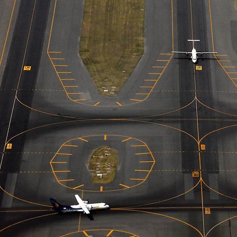 Airports are boring only if you don't know where to look. Sometimes, lines and planes can align into a wonderful frame. @yogesh.manhas caught this moment as he was taking off from Delhi's Indira Gandhi International Airport. 
#avgeek
#avgeekoftheweek
#delhi #airport #igia #airportphotography #planespotting #planespotterpro #india #travel #aerialphotography #bizjets